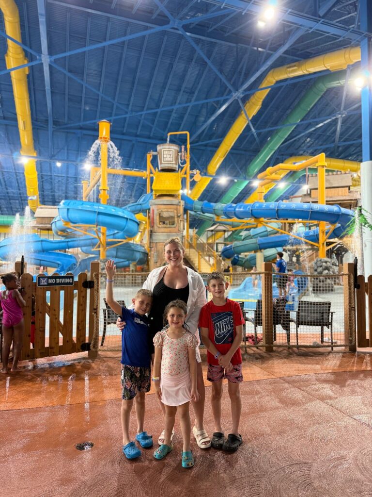 Indoor water park with slides, splash zones, and areas for kids of all ages